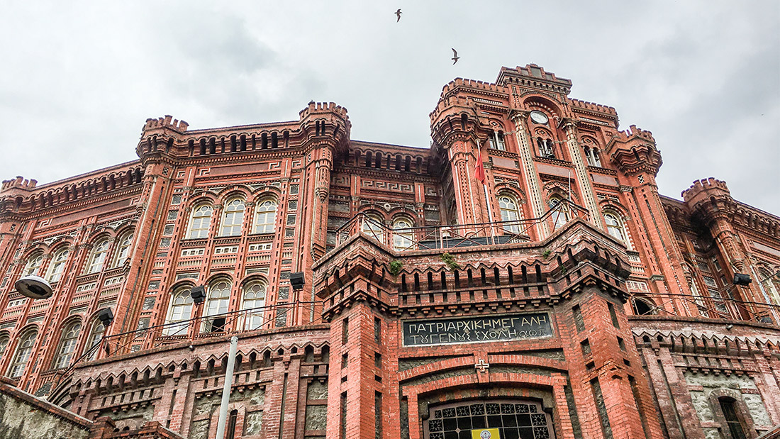 The historic Patriarchal Great School of the Nation (Phanar Greek Orthodox College) featuring its iconic red brick architecture in Fener, Istanbul.